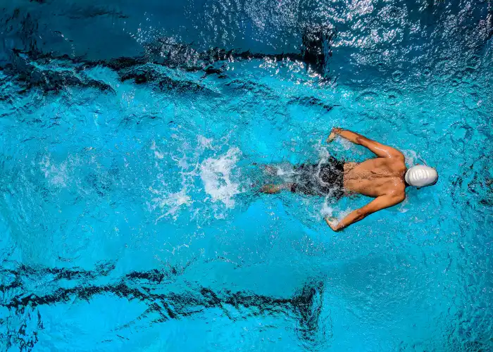 Adjustable resistance swimming machine